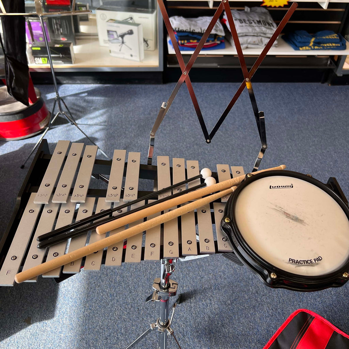 Ludwig Bell kit with drum pad sticks mallets and rolling bag. (used)