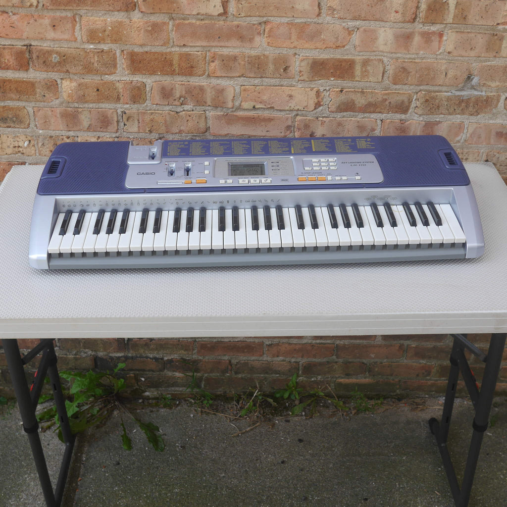 Casio LK-110 61-Key Key-Lighting Keyboard used
