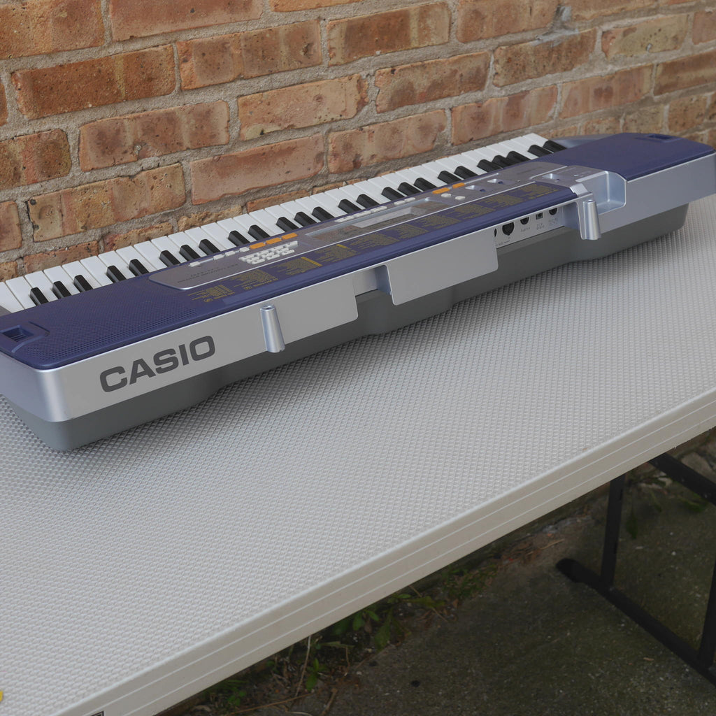 Casio LK-110 61-Key Key-Lighting Keyboard used
