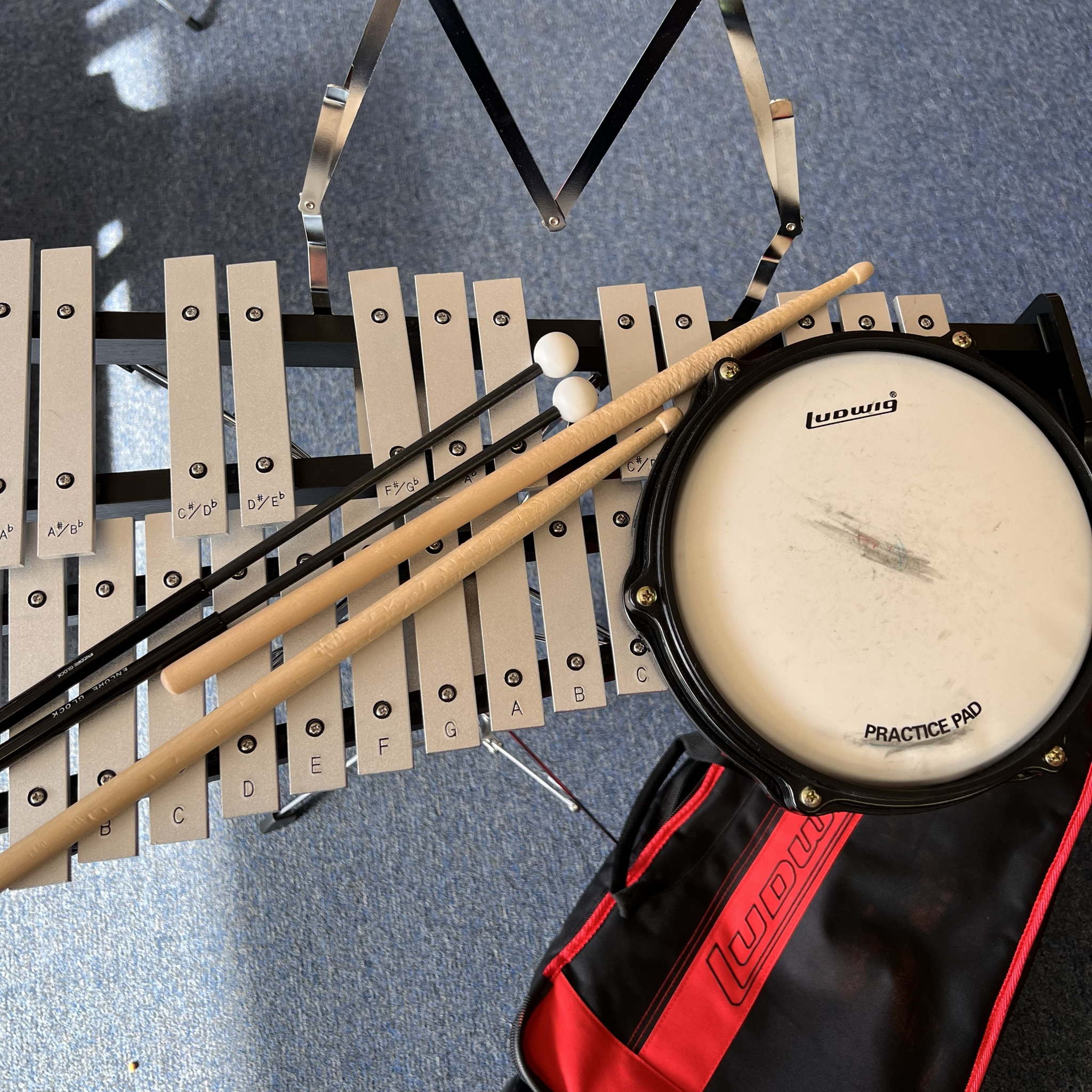 Ludwig Bell kit with drum pad sticks mallets and rolling bag.  (used)