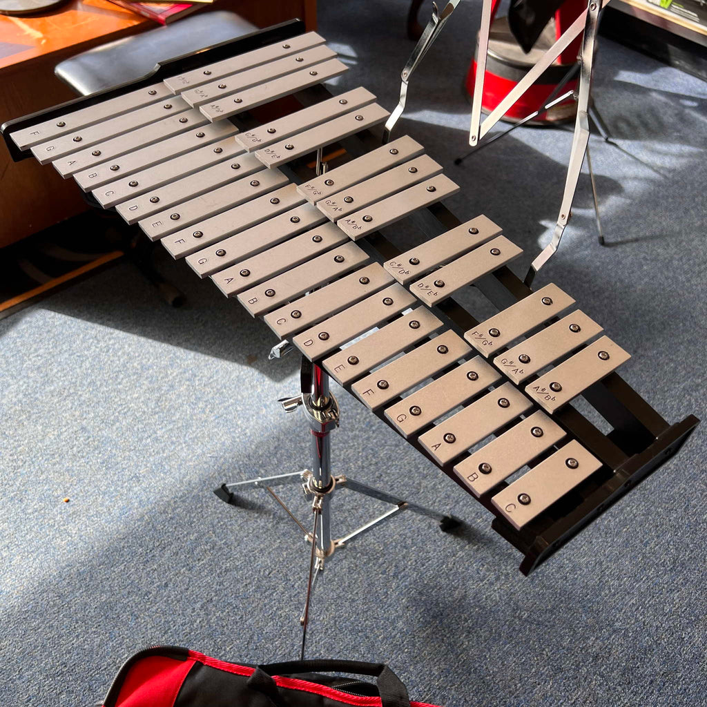 Ludwig Bell kit with drum pad sticks mallets and rolling bag.  (used)
