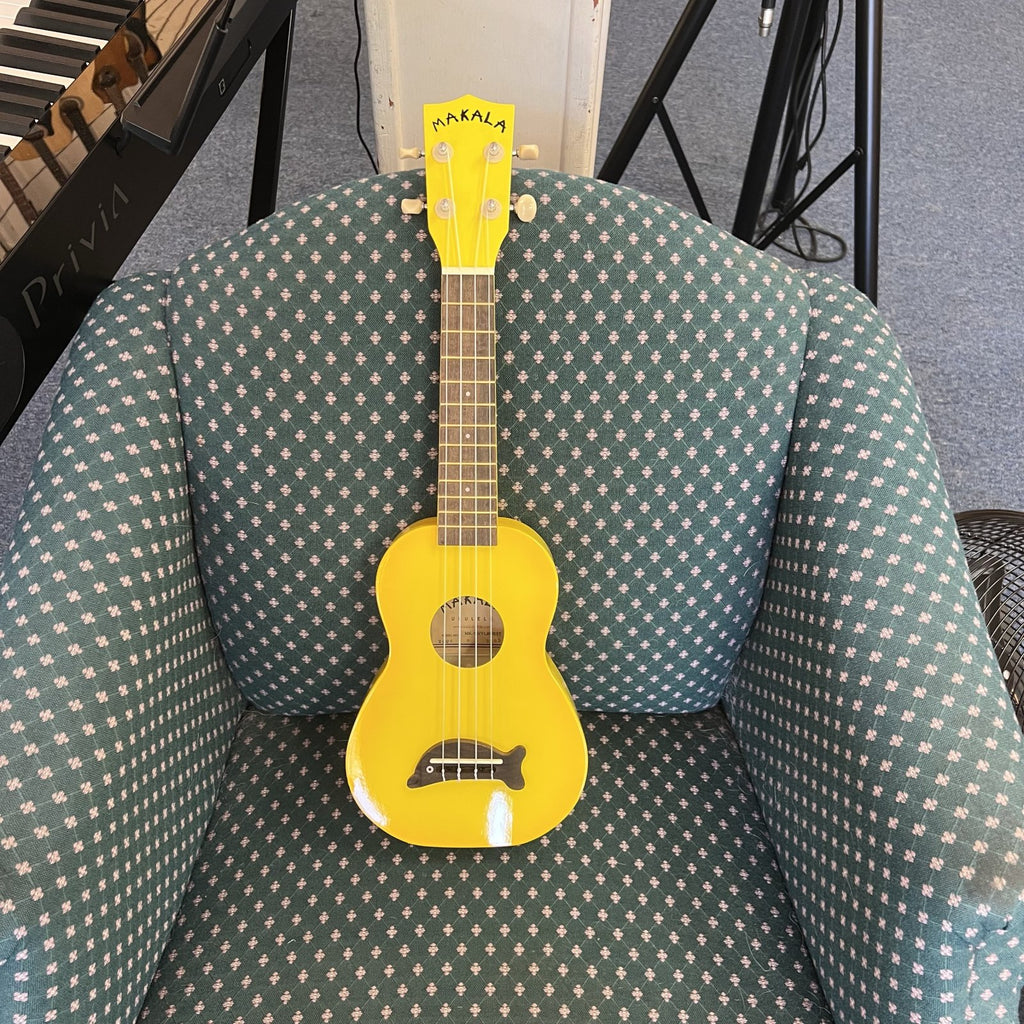 Makala Yellow Burst Soprano Dolphin Ukulele