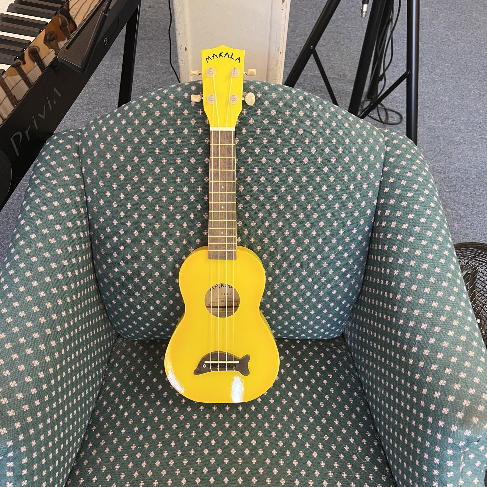Makala Yellow Burst Soprano Dolphin Ukulele