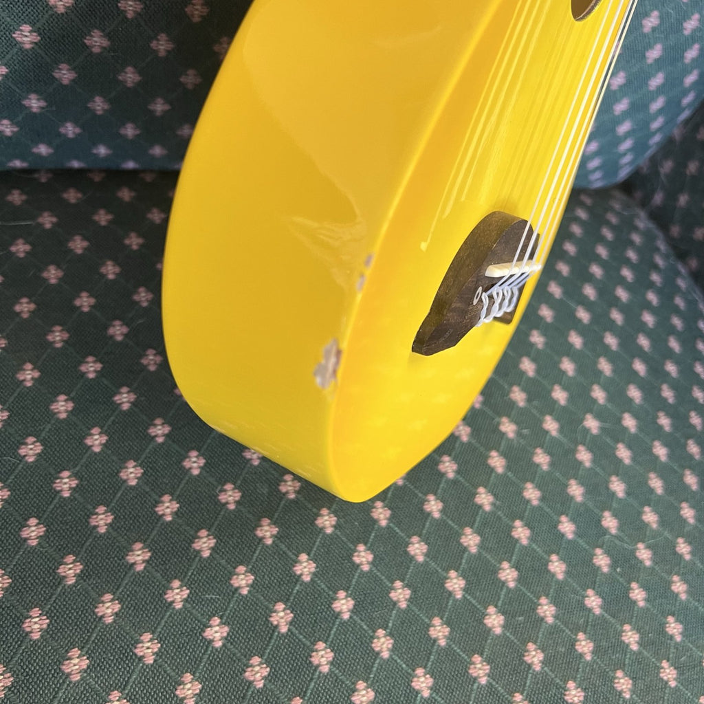Makala Yellow Burst Soprano Dolphin Ukulele