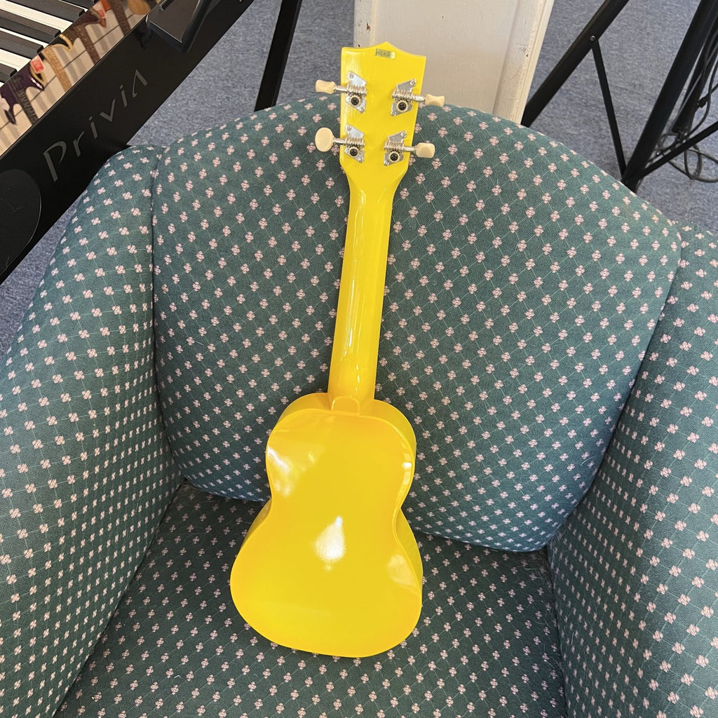Makala Yellow Burst Soprano Dolphin Ukulele
