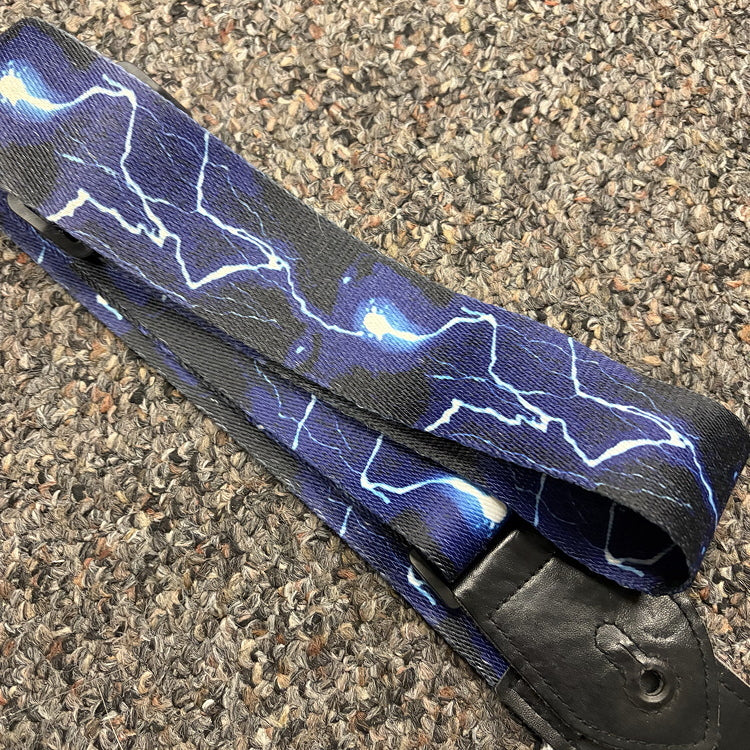 Classic lightning storm guitar strap, used