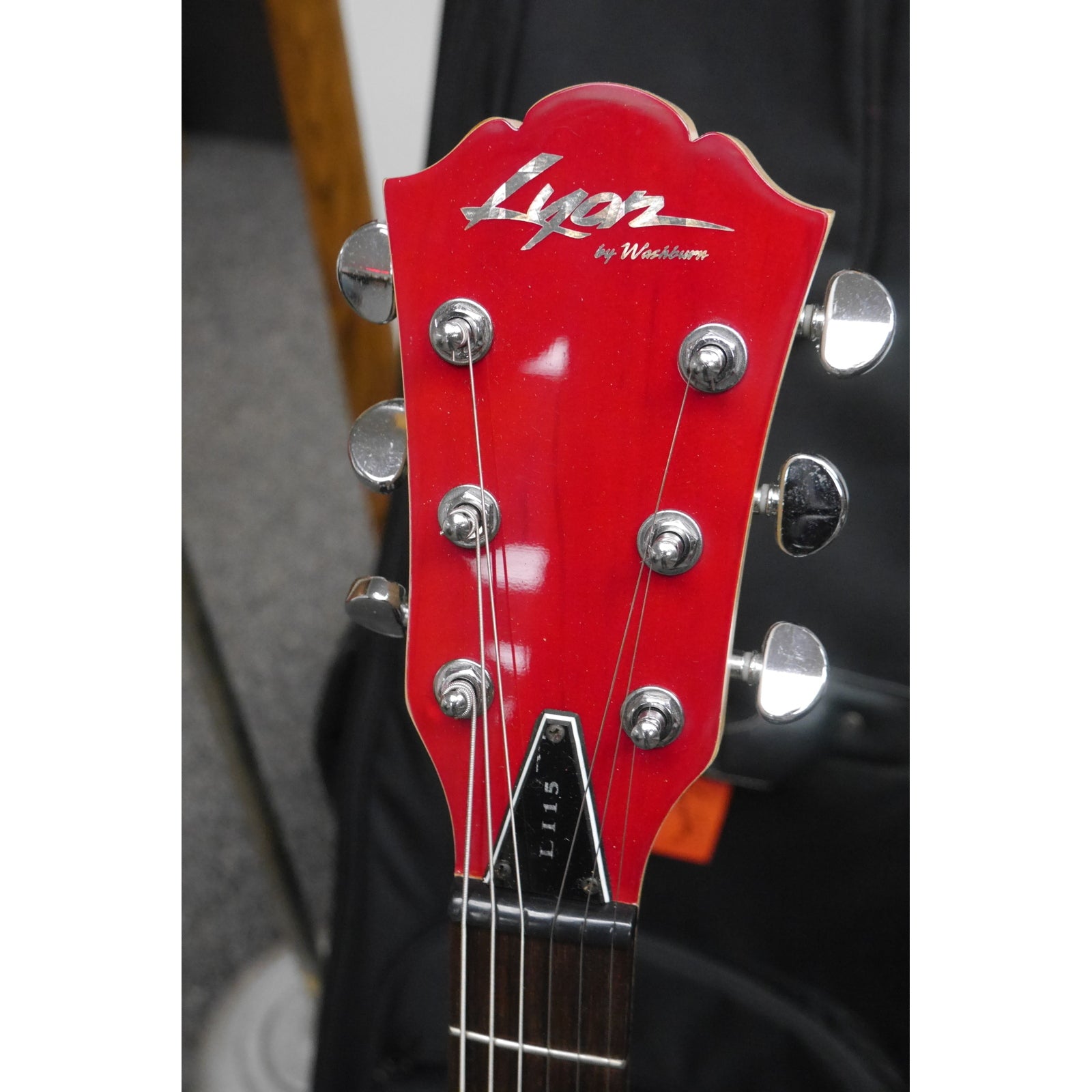 Lyon by Washburn L-115 Red Electric Guitar with Gig Bag.  1990s