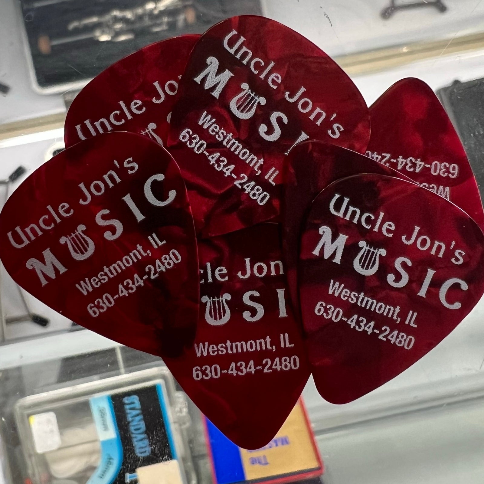 Uncle Jon's Music Red Pearl Celluloid Guitar Picks, 10 Pack Light