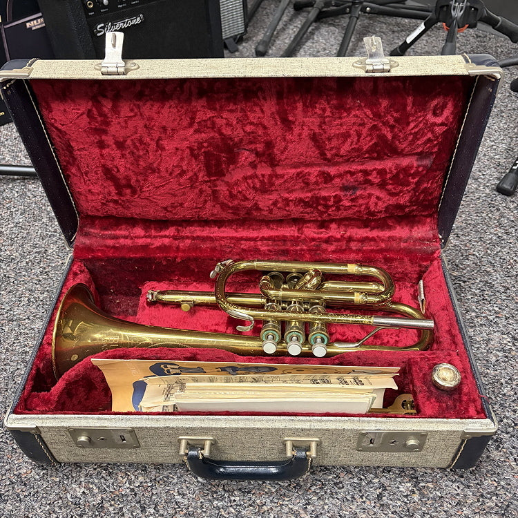 Vintage Bundy Cornet, needs work.  With music and case.