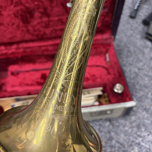 Vintage Bundy Cornet, needs work.  With music and case.